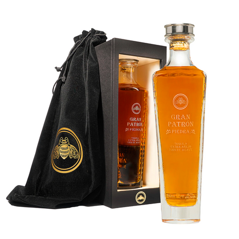 Gran Patrón Piedra Extra Anejo Tequila 750 ml bottle and display case